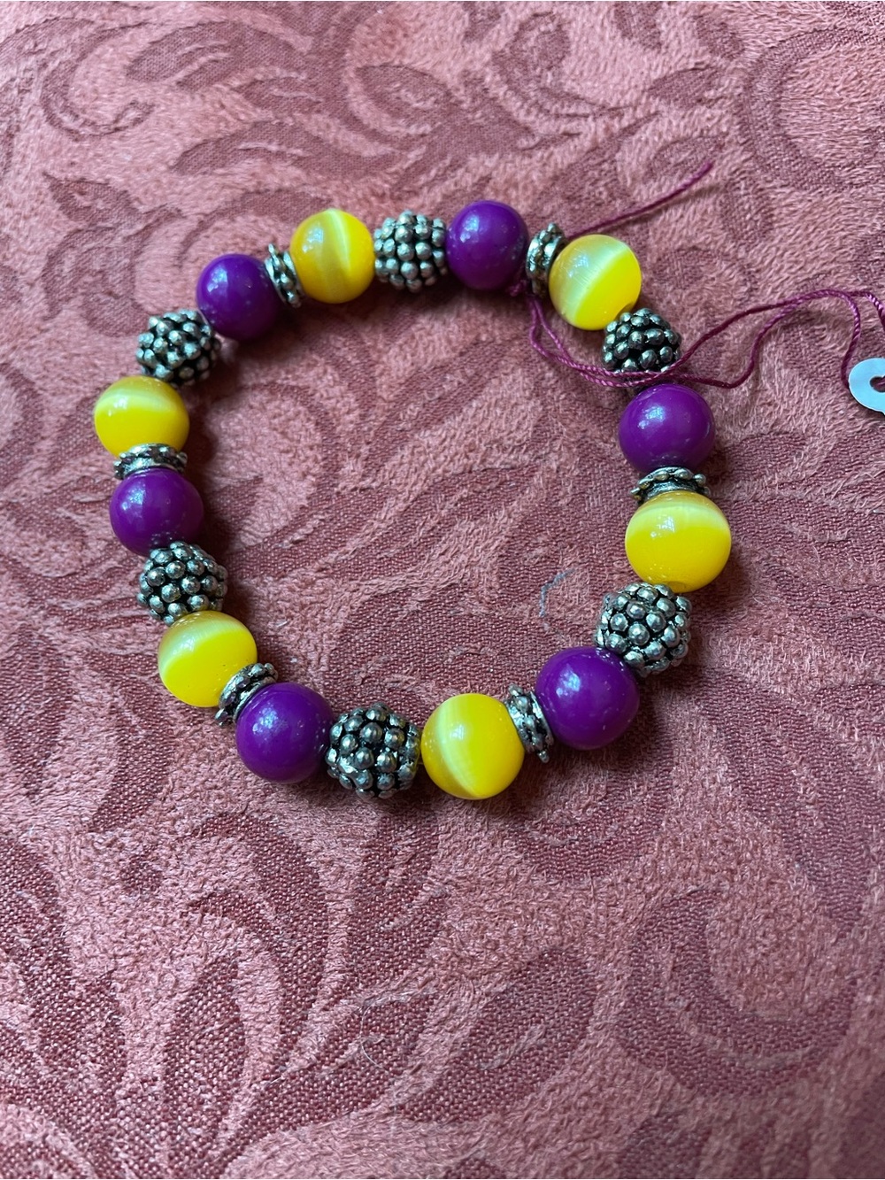 Team colors purple, and yellow, silver spacers, elastic